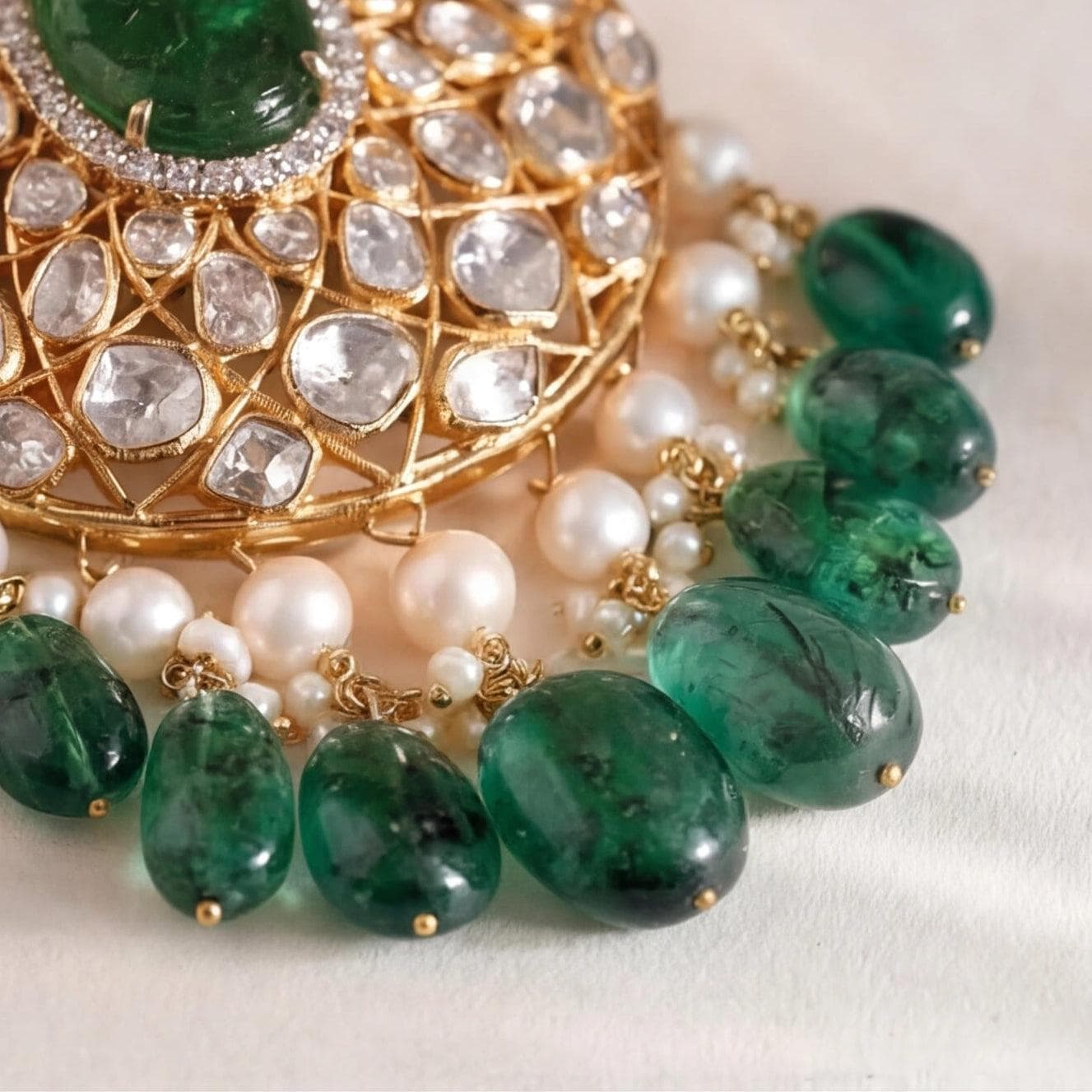 Close-up of handcrafted kundan detailing
